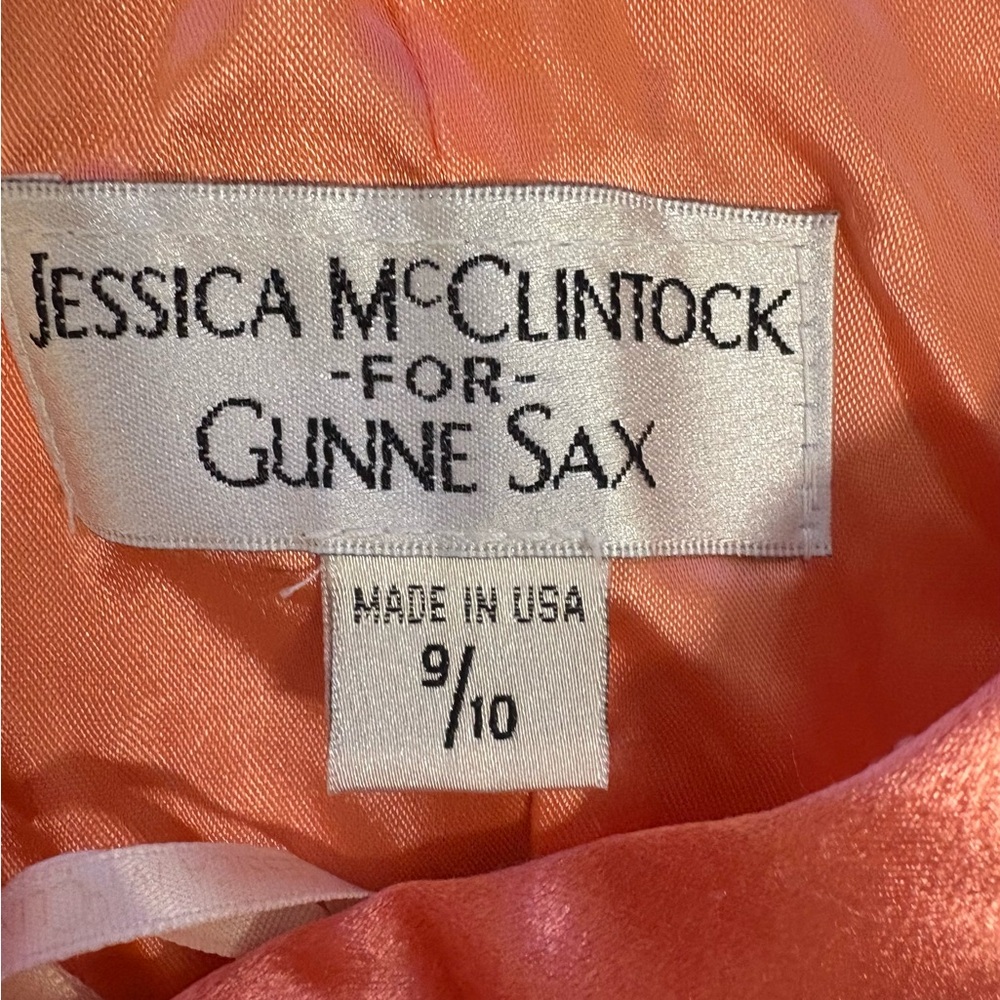 Jessica McClintock Asymmetrical Coral Dress with Floral Accent - Picture 10 of 10